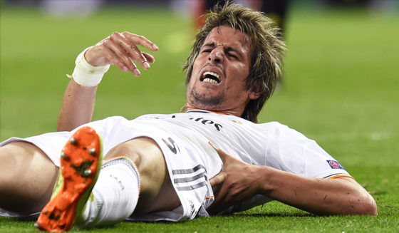 Real Madrid's Portuguese defender Fabio Coentrao reacts during the UEFA Champions League semifinal first leg football match Real Madrid CF vs FC Bayern Munchen at the Santiago Bernabeu stadium in Madrid on April 23, 2014. AFP PHOTO/ GERARD JULIEN (Photo credit should read GERARD JULIEN/AFP/Getty Images)