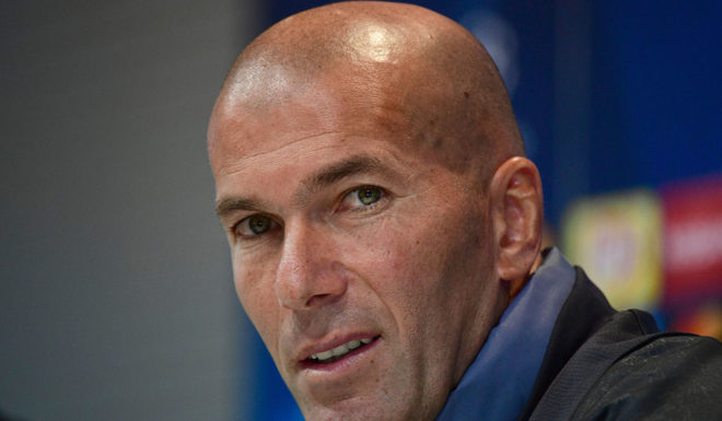Real Madrid's French coach Zinedine Zidane listens during a press conference at Valdebebas Sport City in Madrid on October 17, 2016 on the eve of their Champions League football match against Legia Warszawa. / AFP / PIERRE-PHILIPPE MARCOU (Photo credit should read PIERRE-PHILIPPE MARCOU/AFP/Getty Images)