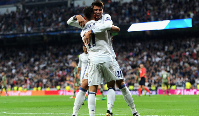 MADRID, SPAIN - OCTOBER 18: Lucas Vazquez (front) of Real Madrid celebrates scoring his team's fourth goal with his team mate Alvaro Morata during the UEFA Champions League Group F match between Real Madrid CF and Legia Warszawa at Bernabeu on October 18, 2016 in Madrid, Spain. (Photo by Denis Doyle/Getty Images)
