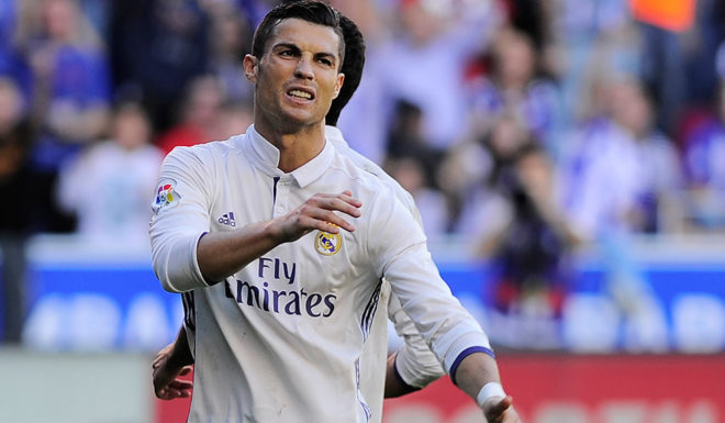 Real Madrid's Portuguese forward Cristiano Ronaldo gestures during the Spanish league football match between Deportivo Alaves and Real Madrid CF at the Mendizorroza stadium in Vitoria on October 29, 2016. / AFP / ANDER GILLENEA (Photo credit should read ANDER GILLENEA/AFP/Getty Images)
