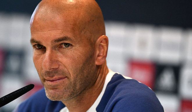 Real Madrid's French coach Zinedine Zidane looks on during a press conference at Valdebebas training ground in Madrid on September 9, 2016, on the eve of the Spanish League match Real Madrid CF vs Osasuna. / AFP / GERARD JULIEN (Photo credit should read GERARD JULIEN/AFP/Getty Images)