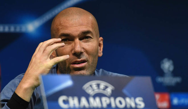 Real Madrid's French head coach Zinedine Zidane gestures during a press conference at Alvalade stadium in Lisbon on November 21, 2016, on the eve of the UEFA Champions League group F football match Sporting CP vs Real Madrid. / AFP / FRANCISCO LEONG (Photo credit should read FRANCISCO LEONG/AFP/Getty Images)