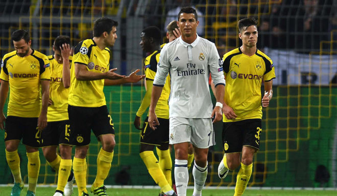 Real Madrid's Portuguese forward Cristiano Ronaldo reacts during the UEFA Champions League first leg football match between Borussia Dortmund and Real Madrid at BVB stadium in Dortmund, on September 27, 2016. / AFP / PATRIK STOLLARZ (Photo credit should read PATRIK STOLLARZ/AFP/Getty Images)