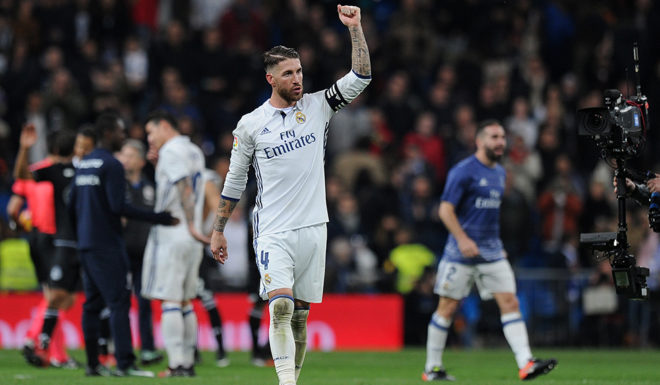 MADRID, SPAIN - DECEMBER 10: Sergio Ramos of Real Madrid celebrates after Real beat RC Deportivo La Coruna 3-2 in the La Liga match between Real Madrid CF and RC Deportivo La Coruna at Estadio Santiago Bernabeu on December 10, 2016 in Madrid, Spain. (Photo by Denis Doyle/Getty Images)