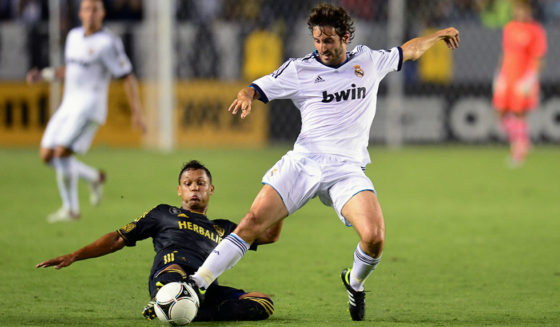 Real Madrid's Esteban Granero (R) fights for the ball with Kenny Walker of the LA Galaxy (L) during their World Football Challenge friendly football match on August 2, 2012 in Carson, California. Real Madrid won 5-1. AFP PHOTO / Frederic J. BROWN (Photo credit should read FREDERIC J. BROWN/AFP/GettyImages)