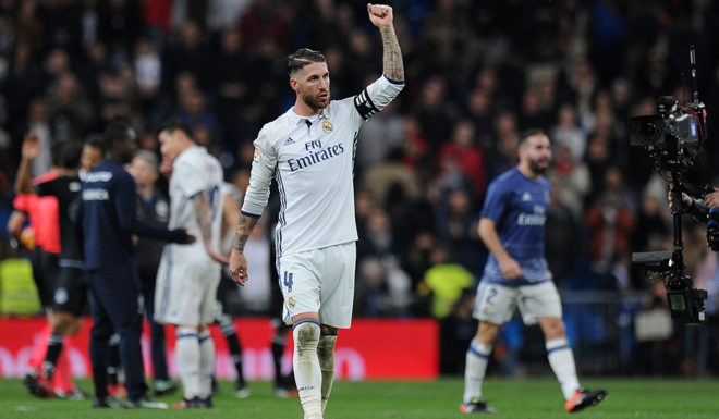 MADRID, SPAIN - DECEMBER 10: Sergio Ramos of Real Madrid celebrates after Real beat RC Deportivo La Coruna 3-2 in the La Liga match between Real Madrid CF and RC Deportivo La Coruna at Estadio Santiago Bernabeu on December 10, 2016 in Madrid, Spain. (Photo by Denis Doyle/Getty Images)