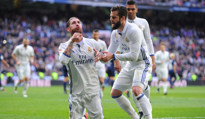 MADRID, SPAIN - JANUARY 21: Sergio Ramos of Real Madrid celebrates with Nacho after scoring his team's 1st goal during the La Liga match between Real Madrid CF and Malaga CF at the Bernabeu on January 21, 2017 in Madrid, Spain. (Photo by Denis Doyle/Getty Images)