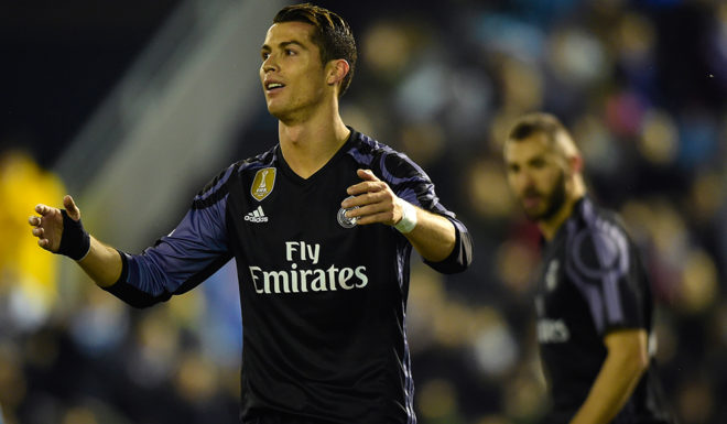 Real Madrid's Portuguese forward Cristiano Ronaldo reacts after missing a goal opportunity during the Spanish Copa del Rey (King's Cup) quarter final second leg football match RC Celta de Vigo vs Real Madrid CF RC Celta de Vigo on January 25, 2017. / AFP / MIGUEL RIOPA (Photo credit should read MIGUEL RIOPA/AFP/Getty Images)