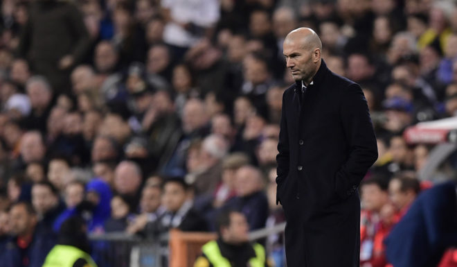 Real Madrid's French coach Zinedine Zidane stands on the sideline during the Spanish league football match Real Madrid CF vs UD Las Palmas at the Santiago Bernabeu stadium in Madrid on March 1, 2017. / AFP PHOTO / JAVIER SORIANO (Photo credit should read JAVIER SORIANO/AFP/Getty Images)