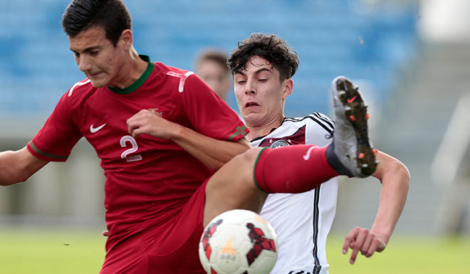 LOULÉ, PORTUGAL - FEBRUARY 9: Diogo Dalot of Portugal challenges Kai Havertz of Germany during the UEFA Under17 match between U17 Portugal v U17 Germany on February 9, 2016 in Estádio Algarve, Loulé, Portugal. (Photo by Filipe Farinha/Bongarts/Getty Images)