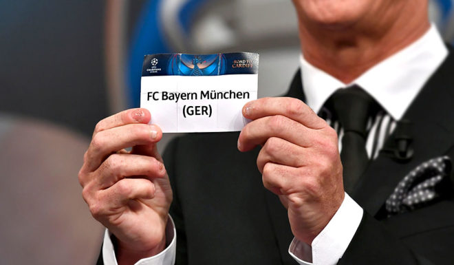 Liverpool football legend and UEFA Champions League Final Ambassador Ian Rush shows a piece of paper bearing the name of FC Bayern Munchen during the quarter-final draw for the UEFA Champions League football tournament at the UEFA headquarters in Nyon on December 17, 2017. / AFP PHOTO / Fabrice COFFRINI (Photo credit should read FABRICE COFFRINI/AFP/Getty Images)