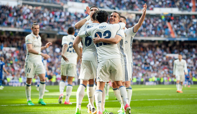 MADRID, SPAIN - APRIL 02: Nacho of Real Madrid celebrates with Isco Alarcon and Lucas Vazquez after scoring Real's 3rd goal during the La Liga match between Real Madrid CF and Deportivo Alaves on April 2, 2017 in Madrid, Spain. (Photo by Denis Doyle/Getty Images)