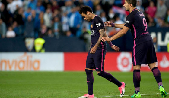 Barcelona's Brazilian forward Neymar da Silva (L) walks during the Spanish league football match Malaga CF vs FC Barcelona at La Rosaleda stadium in Malaga on April 8, 2017. / AFP PHOTO / JORGE GUERRERO (Photo credit should read JORGE GUERRERO/AFP/Getty Images)