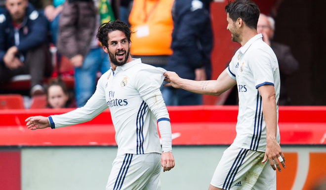 GIJON, SPAIN - APRIL 15: Isco of Real Madrid celebrates with his teammates Alvaro Morata of Real Madrid after scoring his team's third goal during the La Liga match between Real Sporting de Gijon and Real Madrid at Estadio El Molinon on April 15, 2017 in Gijon, Spain. (Photo by Juan Manuel Serrano Arce/Getty Images)