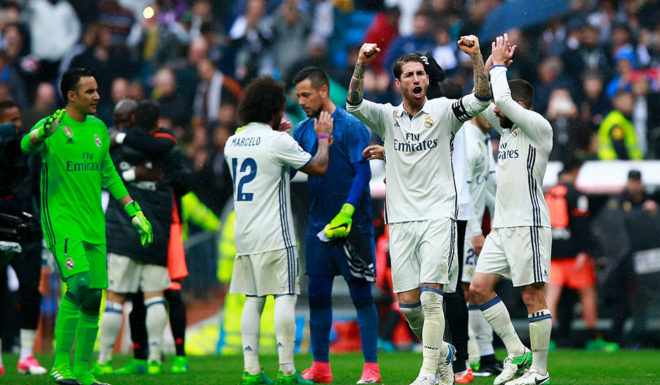 MADRID, SPAIN - APRIL 29: Sergio Ramos (2ndR) of Real Madrid CF celebrates with teammates goalkeeper Keylor Navas (L) and Marcelo (2ndL) after the La Liga match between Real Madrid CF and Valencia CF at Estadio Santiago Bernabeu on April 29, 2017 in Madrid, Spain. (Photo by Gonzalo Arroyo Moreno/Getty Images)