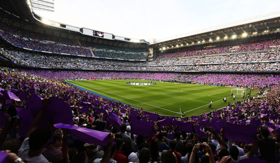 A general view shows Real Madrid fans display purple and white papers before the UEFA Champions League semi-final second leg football match Real Madrid CF vs Manchester City FC at the Santiago Bernabeu stadium in Madrid, on May 4, 2016. / AFP / CESAR MANSO (Photo credit should read CESAR MANSO/AFP/Getty Images)