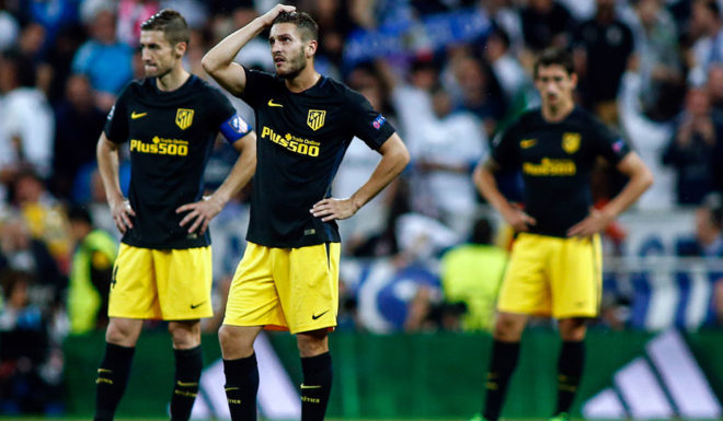 Atletico Madrid's midfielder Koke (C) gestures at the end of the UEFA Champions League semifinal first leg football match Real Madrid CF vs Club Atletico de Madrid at the Santiago Bernabeu stadium in Madrid, on May 2, 2017. / AFP PHOTO / OSCAR DEL POZO (Photo credit should read OSCAR DEL POZO/AFP/Getty Images)