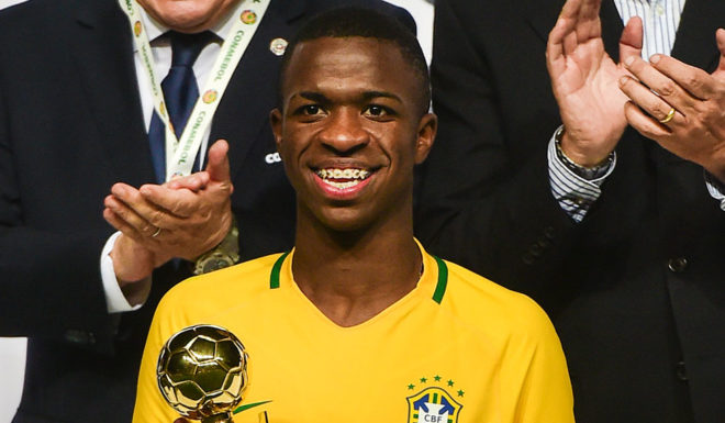 Brazil´s Vinicius Junior poses with the best player trophy in the South American U-17 football tournament in Rancagua, some 90 km south of Santiago de Chile on March 19, 2017. / AFP PHOTO / MARTIN BERNETTI (Photo credit should read MARTIN BERNETTI/AFP/Getty Images)