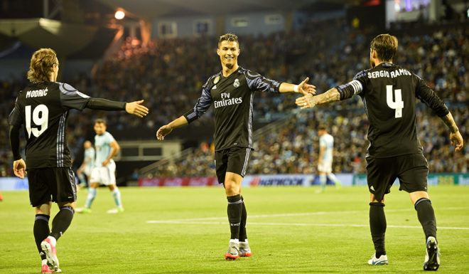 VIGO, SPAIN - MAY 17: Luka Modric, Cristiano Ronaldo and Sergio Ramos of Real Madrid celebrates the third goal against RC Celta during the La Liga match, between Celta Vigo and Real Madrid at Estadio Balaidos on May 17, 2017 in Vigo, Spain. (Photo by Octavio Passos/Getty Images)