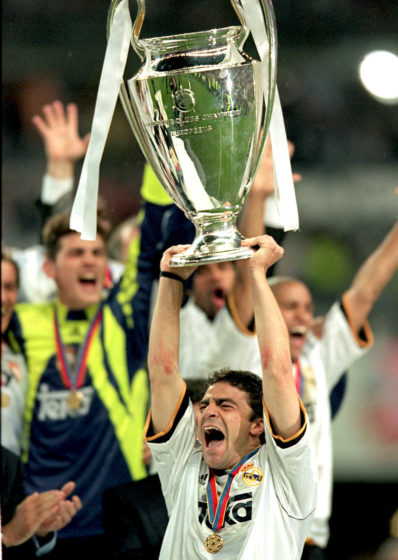 24 May 2000: Manuel Sanchis of Real Madrid holds the trophy high after the European Champions League Final 2000 against Valencia at the Stade de France, Saint-Denis, France. Real Madrid won 3-0. Mandatory Credit: Shaun Botterill /Allsport