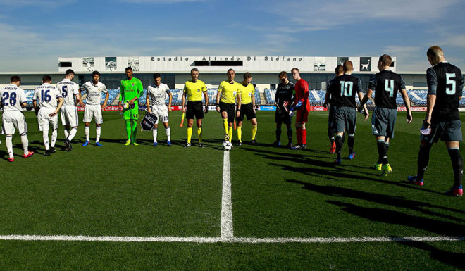 MADRID, SPAIN - MARCH 08: AFC Ajax, (R) Real Madrid (L) players and referees enters to the pitch prior to start the UEFA Youth League Quarter Final match between Real Madrid CF and AFC Ajax at Estadio Alfredo Di Stefano on March 8, 2017 in Madrid, Spain. (Photo by Gonzalo Arroyo Moreno/Getty Images)