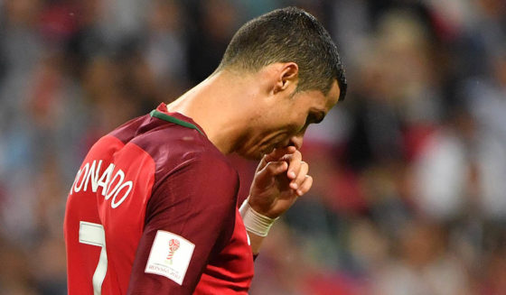 Portugal's forward Cristiano Ronaldo reacts during the 2017 Confederations Cup semi-final football match between Portugal and Chile at the Kazan Arena in Kazan on June 28, 2017. / AFP PHOTO / Yuri CORTEZ (Photo credit should read YURI CORTEZ/AFP/Getty Images)