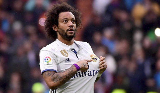 Real Madrid's Brazilian defender Marcelo celebrates a goal during the Spanish league football match Real Madrid CF vs Valencia CF at the Santiago Bernabeu stadium in Madrid on April 29, 2017. / AFP PHOTO / PIERRE-PHILIPPE MARCOU (Photo credit should read PIERRE-PHILIPPE MARCOU/AFP/Getty Images)