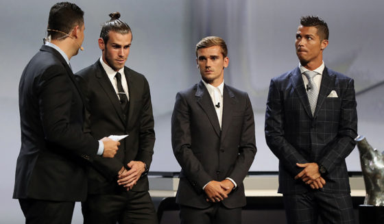 (From 2nd L) Real Madrid's Welsh forward Gareth Bale, Atletico Madrid's French forward Antoine Griezmann and Real Madrid's Portuguese forward Cristiano Ronaldo take part in the awarding ceremony for the Best Men's player in Europe at the end of the UEFA Champions League Group stage draw ceremony, on August 25, 2016 in Monaco. / AFP / Valery HACHE (Photo credit should read VALERY HACHE/AFP/Getty Images)