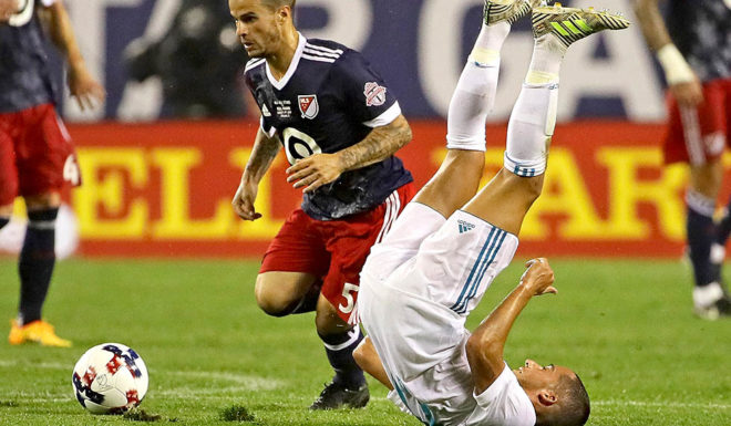 CHICAGO, IL - AUGUST 02: Sebastian Giovinco #5 of the MLS All-Stars moves around Lucas Vazquez of Real Mardrid during the 2017 MLS All- Star Game at Soldier Field on August 2, 2017 in Chicago, Illinois. (Photo by Jonathan Daniel/Getty Images)