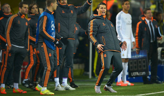 DORTMUND, GERMANY - APRIL 08: Cristiano Ronaldo of Real Madrid reacts with team mates as they wait for the final whistle during the UEFA Champions League Quarter Final second leg match between Borussia Dortmund and Real Madrid at Signal Iduna Park on April 8, 2014 in Dortmund, Germany. (Photo by Dennis Grombkowski/Bongarts/Getty Images)
