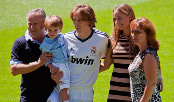 MADRID, SPAIN - AUGUST 27: Luka Modric holds his son and poses with his wife Vanja Bosnic and his parents during Luka's presentation as a new Real Madrid player at Estadio Santiago Bernabeu on August 27, 2012 in Madrid, Spain. (Photo by Gonzalo Arroyo Moreno/Getty Images)