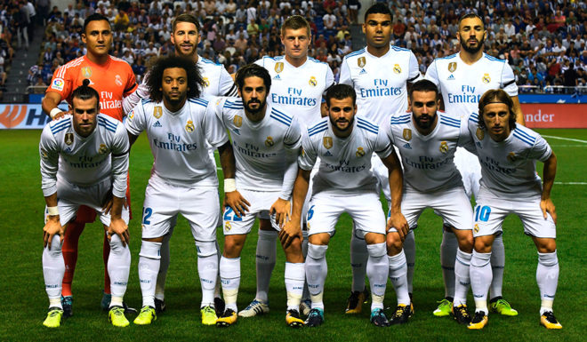 (From back left) Real Madrid's players: Costa Rican goalkeeper Keylor Navas, defender Sergio Ramos, German midfielder Toni Kroos, Brazilian midfielder Casemiro, French forward Karim Benzema, Welsh forward Gareth Bale, Brazilian defender Marcelo, midfielder Isco, defender Nacho Fernandez, defender Dani Carvajal and Croatian midfielder Luka Modric pose before the Spanish league footbal match RC Deportivo de la Coruna vs Real Madrid CF at the Municipal de Riazor stadium in La Coruna on August 20, 2017. / AFP PHOTO / MIGUEL RIOPA (Photo credit should read MIGUEL RIOPA/AFP/Getty Images)