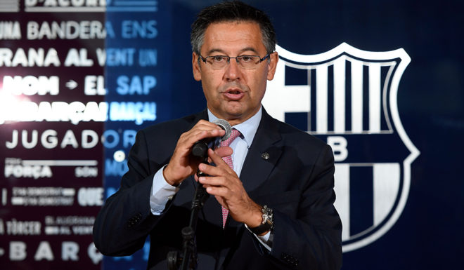 Barcelona's president Josep Maria Bartomeu speaks during the official presentation of Barcelona's new Brazilian football player Paulinho Bezerra, after signing his new contract with the Catalan club at the Camp Nou stadium in Barcelona on August 17, 2017. / AFP PHOTO / LLUIS GENE (Photo credit should read LLUIS GENE/AFP/Getty Images)