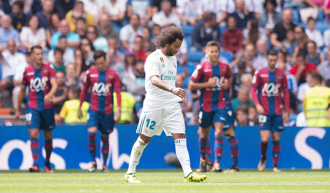 MADRID, SPAIN - SEPTEMBER 09: Marcelo of Real Madrid CF reacts after Levante scored their opening goal during the La Liga match between Real Madrid and Levante at Estadio Santiago Bernabeu on September 9, 2017 in Madrid, . (Photo by Denis Doyle/Getty Ima