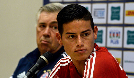 Bayern Munich's midfielder James Rodriguez (R) and head coach Carlo Ancelotti attend a pre-match press conference in Singapore on July 24, 2017, ahead of the International Champions Cup football match between Bayern Munich and Chelsea on July 25. / AFP PHOTO / ROSLAN RAHMAN (Photo credit should read ROSLAN RAHMAN/AFP/Getty Images)