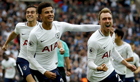 Tottenham Hotspur's Danish midfielder Christian Eriksen (R) celebrates with Tottenham Hotspur's English midfielder Dele Alli scoring the team's first goal during the English Premier League football match between Tottenham Hotspur and Bournemouth at Wembley Stadium in London, on October 14, 2017. / AFP PHOTO / Adrian DENNIS / RESTRICTED TO EDITORIAL USE. No use with unauthorized audio, video, data, fixture lists, club/league logos or 'live' services. Online in-match use limited to 75 images, no video emulation. No use in betting, games or single club/league/player publications. / (Photo credit should read ADRIAN DENNIS/AFP/Getty Images)