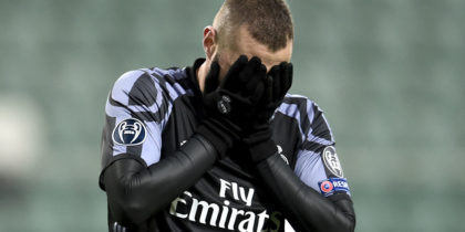 Real Madrid's French forward Karim Benzema reacts after Warsaw scored the 2-2 equalizer during the UEFA Champions League group F football match Legia Warsaw vs Real Madrid CF in Warsaw, Poland on November 2, 2016. / AFP / ODD ANDERSEN (Photo credit should read ODD ANDERSEN/AFP/Getty Images)