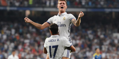 MADRID, SPAIN - AUGUST 27: Toni Kroos of Real Madrid celebrates with Lucas Vazquez after scoring Real's 2nd goal during the La Liga match between Real Madrid CF and RC Celta de Vigo at Estadio Santiago Bernabeu on August 27, 2016 in Madrid, Spain. (Photo by Denis Doyle/Getty Images)