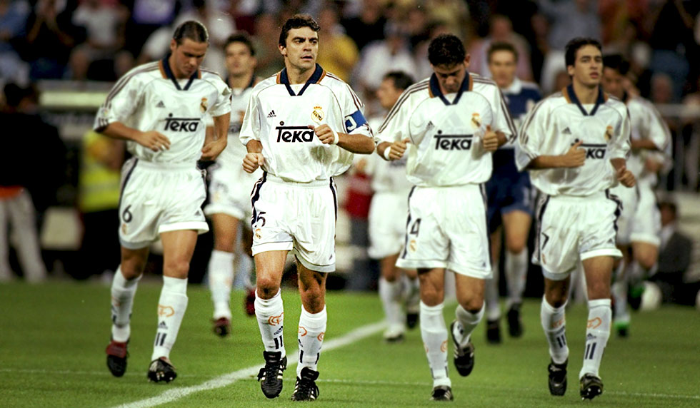 19 Sep 1998: The Real Madrid captain Manuel Sanchis leads his team onto the field to start a match against Barcelona in Madrid, Spain. The game ended in a draw 2-2. Mandatory Credit: Clive Mason /Allsport