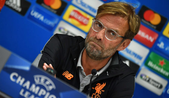 Liverpool manager Jurgen Klopp attends a press conference at Anfield in Liverpool, north west England, on September 12, 2017, on the eve of their Champions League Group E football match against Sevilla. / AFP PHOTO / Anthony Devlin (Photo credit should read ANTHONY DEVLIN/AFP/Getty Images)