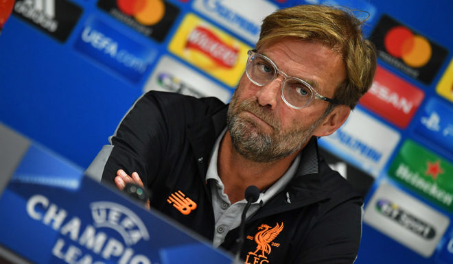 Liverpool manager Jurgen Klopp attends a press conference at Anfield in Liverpool, north west England, on September 12, 2017, on the eve of their Champions League Group E football match against Sevilla. / AFP PHOTO / Anthony Devlin (Photo credit should read ANTHONY DEVLIN/AFP/Getty Images)