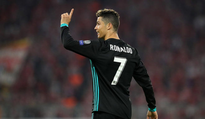 MUNICH, GERMANY - APRIL 25: Cristiano Ronaldo of Real Madrid queastions the officials decision after having a goal dissalowed during the UEFA Champions League Semi Final First Leg match between Bayern Muenchen and Real Madrid at the Allianz Arena on April 25, 2018 in Munich, Germany. (Photo by Alexander Hassenstein/Bongarts/Getty Images)