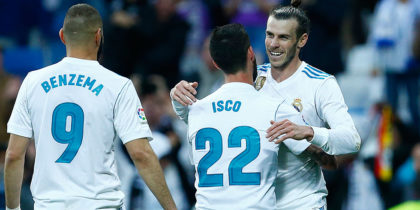 Real Madrid's Welsh forward Gareth Bale (R) celebrates goal during the Spanish league football match between Real Madrid and Celta Vigo at the Santiago Bernabeu Stadium in Madrid on May 12, 2018. (Photo by Benjamin CREMEL / AFP) (Photo credit should read BENJAMIN CREMEL/AFP/Getty Images)