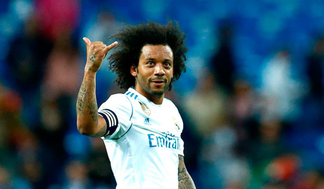 Real Madrid's Brazilian defender Marcelo gestures during the Spanish league football match between Real Madrid and Celta Vigo at the Santiago Bernabeu Stadium in Madrid on May 12, 2018. (Photo by Benjamin CREMEL / AFP) (Photo credit should read BENJAMIN CREMEL/AFP/Getty Images)