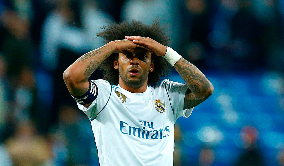 Real Madrid's Brazilian defender Marcelo gestures during the Spanish league football match between Real Madrid and Celta Vigo at the Santiago Bernabeu Stadium in Madrid on May 12, 2018. (Photo by Benjamin CREMEL / AFP) (Photo credit should read BENJAMIN CREMEL/AFP/Getty Images)