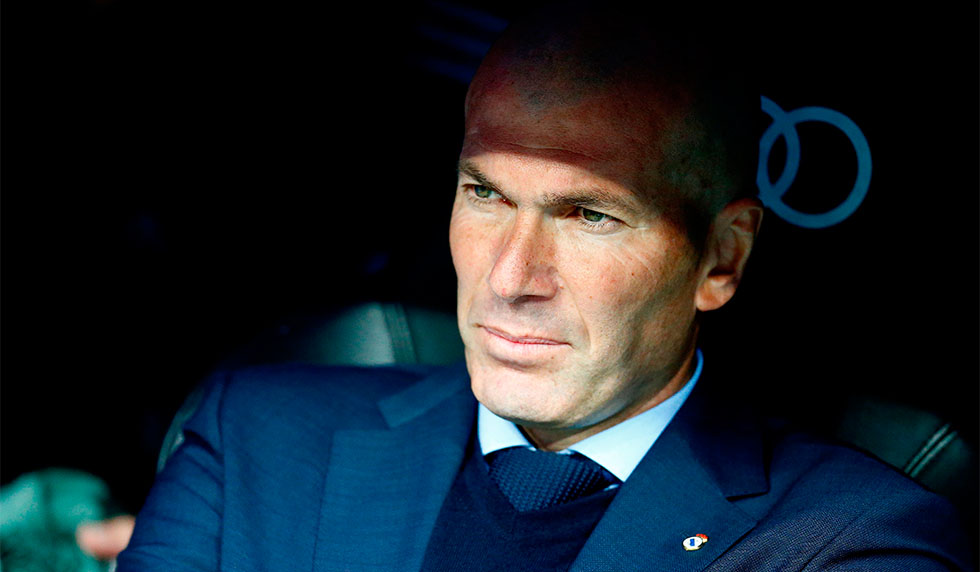 Real Madrid's French coach Zinedine Zidane looks on before the Spanish league football match between Real Madrid and Celta Vigo at the Santiago Bernabeu Stadium in Madrid on May 12, 2018. (Photo by Benjamin CREMEL / AFP) (Photo credit should read BENJAMIN CREMEL/AFP/Getty Images)