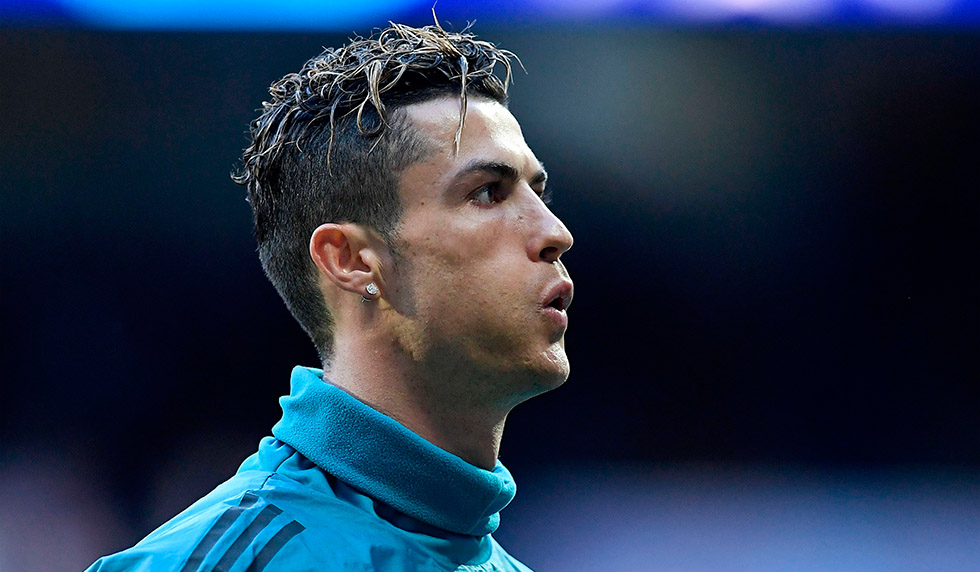 Real Madrid's Portuguese forward Cristiano Ronaldo warms up before the UEFA Champions League semi-final second leg football match between Real Madrid and Bayern Munich at the Santiago Bernabeu Stadium in Madrid on May 1, 2018. (Photo by OSCAR DEL POZO / AFP) (Photo credit should read OSCAR DEL POZO/AFP/Getty Images)