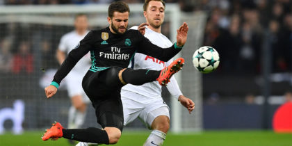 Real Madrid's Spanish defender Nacho Fernandez (L) vies with Tottenham Hotspur's Danish midfielder Christian Eriksen during the UEFA Champions League Group H football match between Tottenham Hotspur and Real Madrid at Wembley Stadium in London, on November 1, 2017. / AFP PHOTO / Ben STANSALL (Photo credit should read BEN STANSALL/AFP/Getty Images)