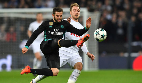 Real Madrid's Spanish defender Nacho Fernandez (L) vies with Tottenham Hotspur's Danish midfielder Christian Eriksen during the UEFA Champions League Group H football match between Tottenham Hotspur and Real Madrid at Wembley Stadium in London, on November 1, 2017. / AFP PHOTO / Ben STANSALL (Photo credit should read BEN STANSALL/AFP/Getty Images)