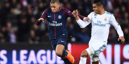 Paris Saint-Germain's French forward Kylian Mbappe (L) vies for the ball with Real Madrid's Brazilian midfielder Casemiro during the UEFA Champions League round of 16 second leg football match between Paris Saint-Germain (PSG) and Real Madrid on March 6, 2018, at the Parc des Princes stadium in Paris. / AFP PHOTO / FRANCK FIFE (Photo credit should read FRANCK FIFE/AFP/Getty Images)
